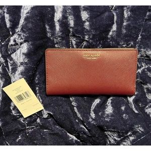NWT Kate spade large slim bifold wallet in cherrywood